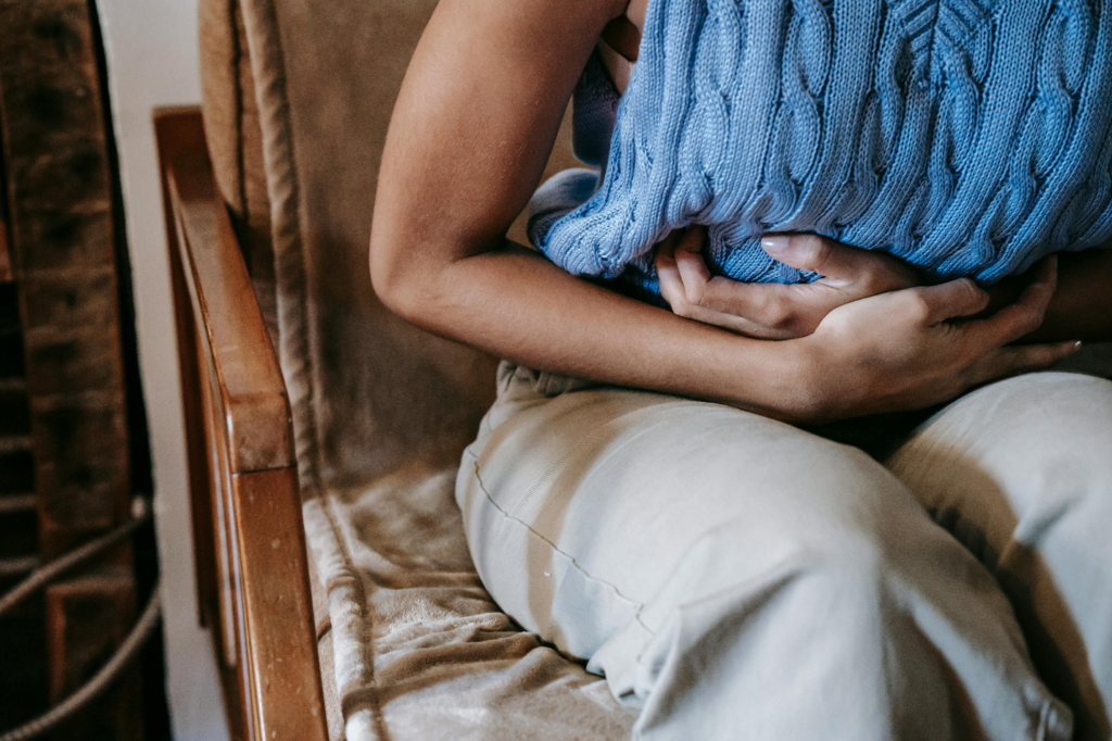 Person suffering from stomach pain