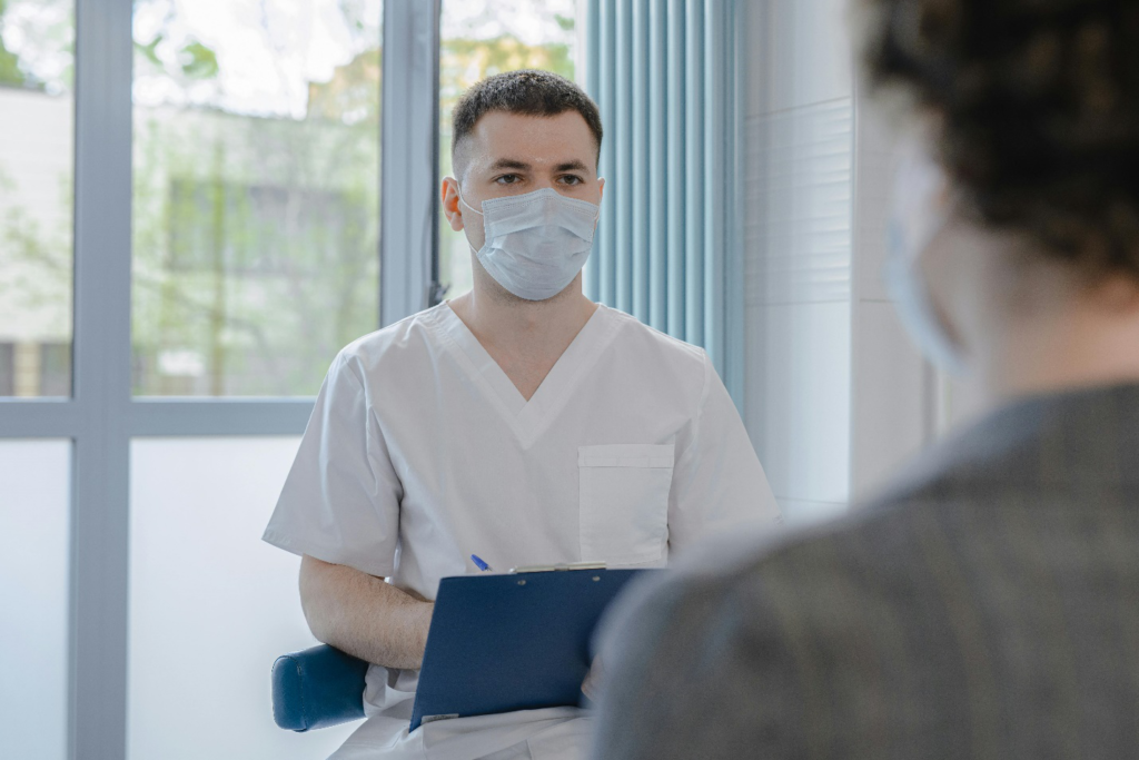 Doctor taking patient history