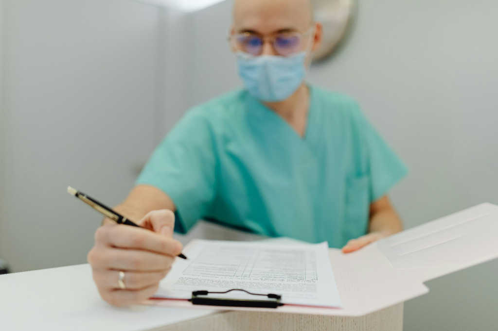 Doctor writing a prescription 