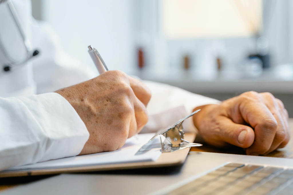 Doctor writing a prescription