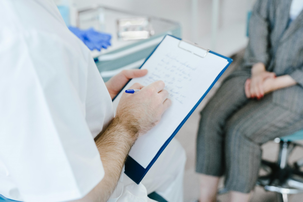 Doctor writing a prescription 