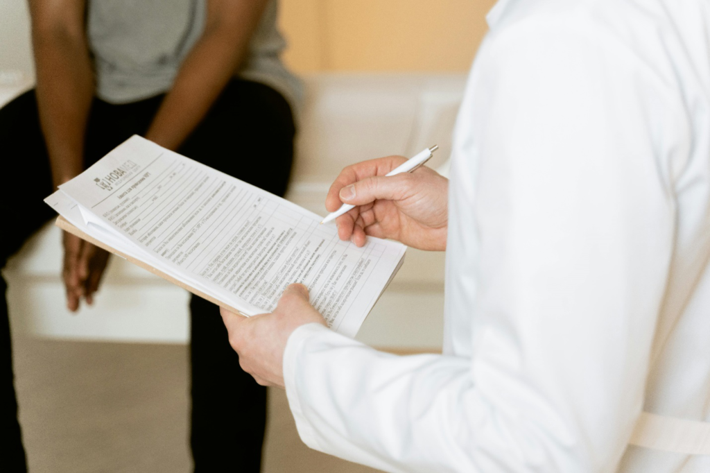 Doctor taking patient history