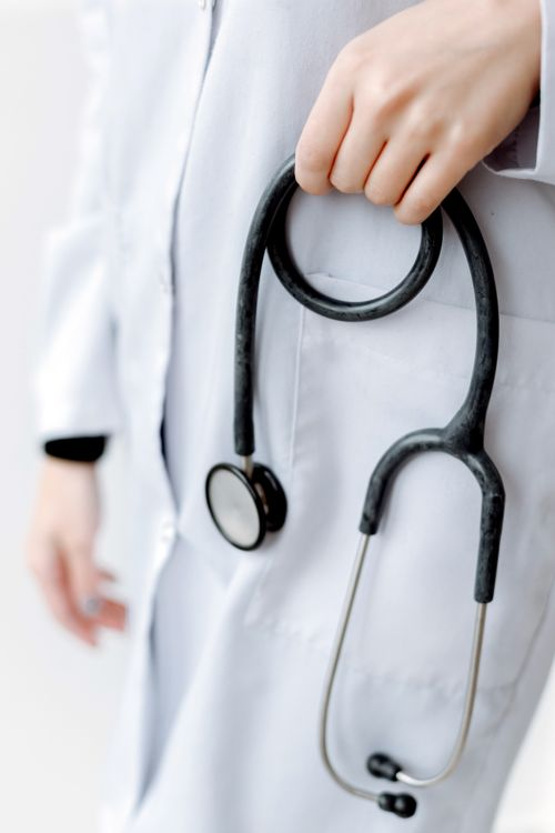 A person holding a stethoscope