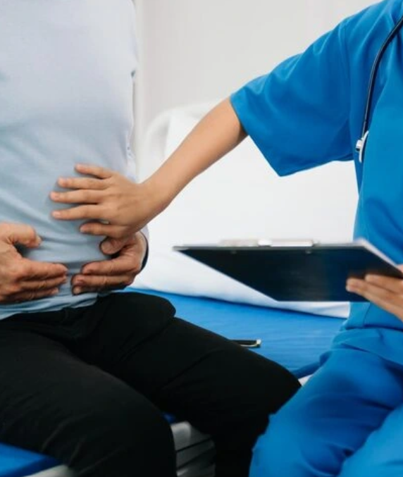 A person with stomach ache and other problems.