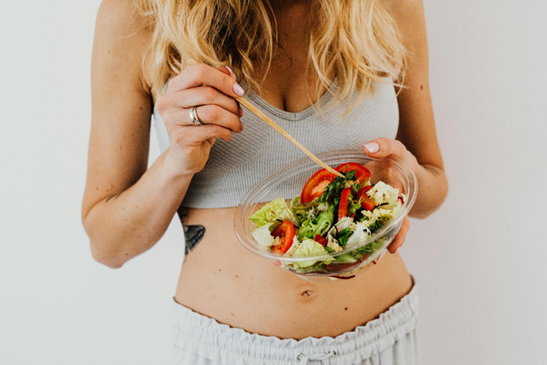 Person eating a salad